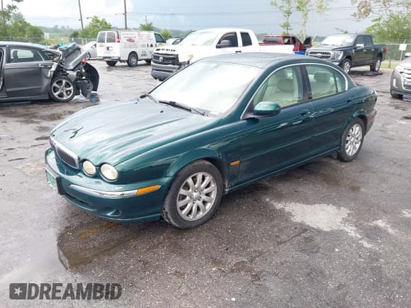 ✅ 2002 Jaguar X-Type • VIN: SAJEA51D92XC15084 • Лот: 42812857. Опубликован ранее на IAAI с пробегом 63 872 миль. Бесплатный доступ к архиву аукционных продаж из США и подробный отчёт об истории автомобиля на DreamBid. Изображение 17.