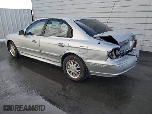 2004 Hyundai Sonata z VIN KMHWF25S04A039620, wystawiony jako Copart lot #84199634 z przebiegiem 227 690 mil mil oraz Szkoda całkowita • Salvage title. Historia ofert i sprzedaży dostępna na DreamBid. Obrazek 2.