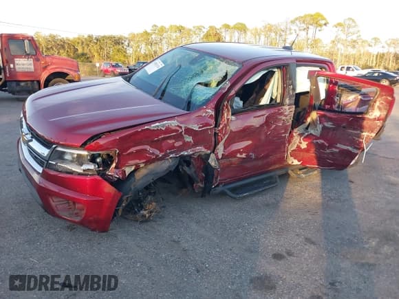 ✅ 2019 Chevrolet Colorado 2WD LT • VIN: 1GCGSCEN8K1345899 • Lot: 43831126. Listed on IAAI with 51,736 mi. Free auction sales archive from the USA and detailed vehicle history report at DreamBid. Image 2.