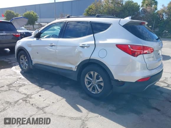 ✅ 2014 Hyundai Santa Fe • VIN: 5XYZU3LB7EG205102 • Lot: 43657537. Wystawiony na IAAI z przebiegiem 142 689 mil. Bezpłatny archiwum sprzedaży aukcyjnych z USA i szczegółowy raport historii pojazdu na DreamBid. Zdjęcie 3.