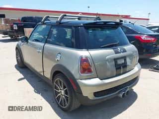 2009 MINI Hardtop S with VIN WMWMF73529TX40576, listed as a IAAI auction lot 42462085 with 77,936 mi miles and . Bid and sale history available at DreamBid. Image 3.