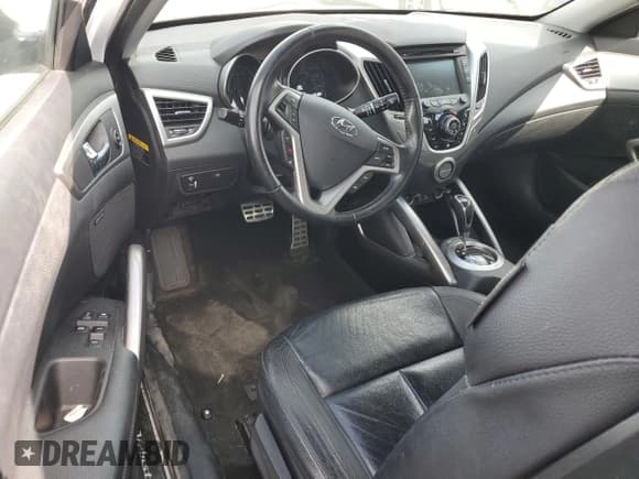 ✅ 2014 Hyundai Veloster • VIN: KMHTC6AD5EU213773 • Lot: 74619554. Wystawiony na Copart z przebiegiem 98 315 mil. Bezpłatny archiwum sprzedaży aukcyjnych z USA i szczegółowy raport historii pojazdu na DreamBid. Zdjęcie 8.