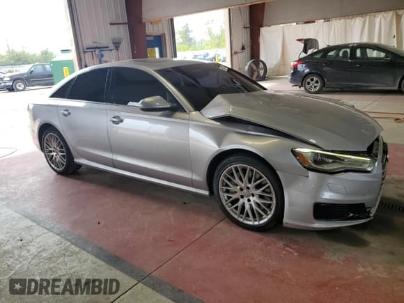 ✅ 2016 Audi A6 Premium • VIN: WAUFFAFC1GN124742 • Lot: 68173615. Listed on Copart with 115,675 mi. Free auction sales archive from the USA and detailed vehicle history report at DreamBid. Image 4.