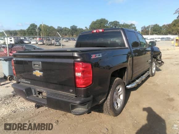 2016 Chevrolet Silverado 1500 LT z VIN 3GCUKREC5GG288672, wystawiony jako IAAI lot #43314900 z przebiegiem 56 245 mil mil oraz . Historia ofert i sprzedaży dostępna na DreamBid. Obrazek 4.