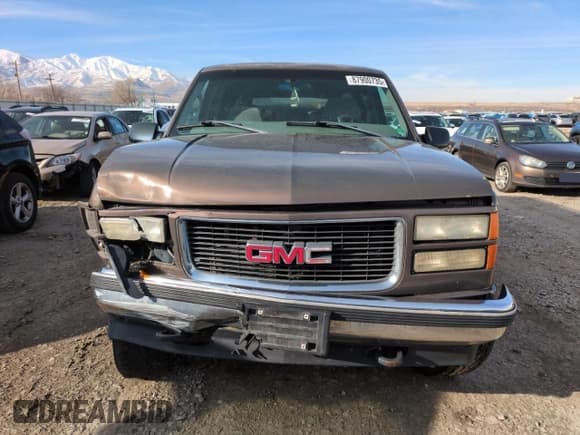 ✅ 1998 GMC Suburban • VIN: 3GKFK16R4WG507685 • Lot: 87900735. Listed on Copart with 183,033 mi. Free auction sales archive from the USA and detailed vehicle history report at DreamBid. Image 5.