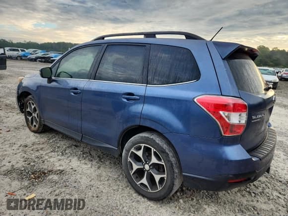 ✅ 2014 Subaru Forester XT Touring • VIN: JF2SJGPC4EH528147 • Lot: 84238845. Listed on Copart with 131,071 mi. Free auction sales archive from the USA and detailed vehicle history report at DreamBid. Image 2.