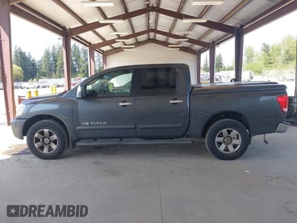 ✅ 2005 Nissan Titan LE • VIN: 1N6AA07B75N553857 • Lot: 42110183. Listed on IAAI with 166,064 mi. Free auction sales archive from the USA and detailed vehicle history report at DreamBid. Image 14.