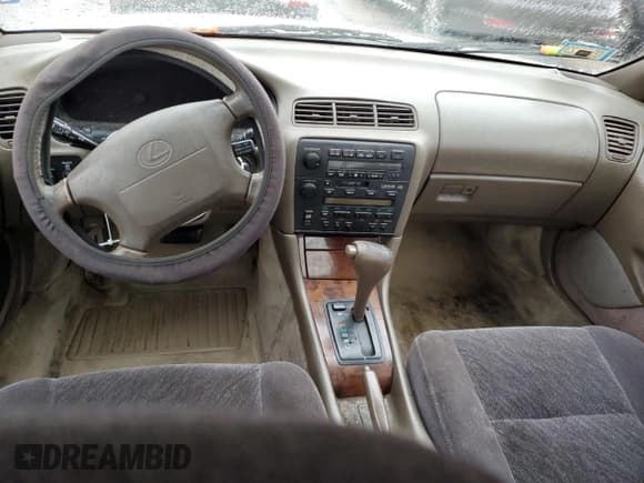 ✅ 1994 Lexus ES 300 • VIN: JT8GK13TXR0062571 • Lot: 82169594. Listed on Copart with 185,501 mi. Free auction sales archive from the USA and detailed vehicle history report at DreamBid. Image 8.