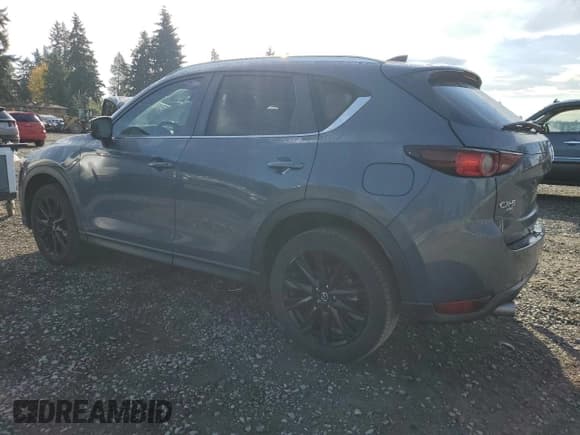 ✅ 2021 Mazda CX-5 Carbon Edition • VIN: JM3KFBCM4M0342940 • Лот: 82695905. Опубликован ранее на Copart с пробегом 42 650 миль. Бесплатный доступ к архиву аукционных продаж из США и подробный отчёт об истории автомобиля на DreamBid. Изображение 2.