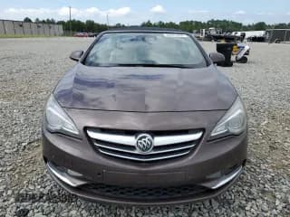 ✅ 2016 Buick Cascada Premium • VIN: W04WT3N52GG089590 • Lot: 68351264. Wystawiony na Copart z przebiegiem 160 072 mil. Bezpłatny archiwum sprzedaży aukcyjnych z USA i szczegółowy raport historii pojazdu na DreamBid. Zdjęcie 5.