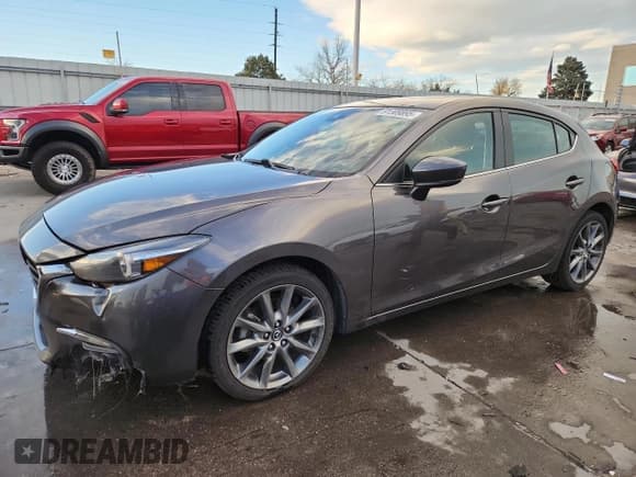 ✅ 2018 Mazda 3 Grand Touring • VIN: 3MZBN1M39JM265774 • Лот: 91309895. Опубликован ранее на Copart с пробегом 59 343 миль. Бесплатный доступ к архиву аукционных продаж из США и подробный отчёт об истории автомобиля на DreamBid. Изображение 1.