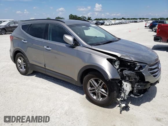 ✅ 2017 Hyundai Santa Fe 2.4L • VIN: 5XYZU3LB4HG381139 • Лот: 46421443. Опубликован ранее на Copart с пробегом 73 306 миль. Бесплатный доступ к архиву аукционных продаж из США и подробный отчёт об истории автомобиля на DreamBid. Изображение 4.