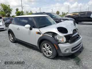2012 MINI Hardtop with VIN WMWSU3C54CT186406, listed as a Copart auction lot 60940305 with 106,819 mi miles and Salvage title. Bid and sale history available at DreamBid. Image 4.