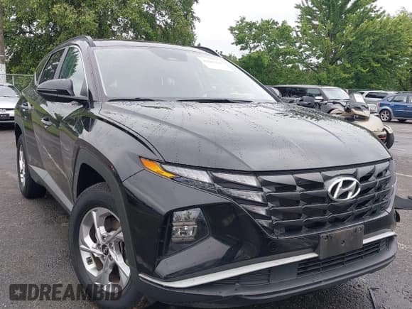 ✅ 2022 Hyundai Tucson SEL • VIN: KM8JBCAE6NU031615 • Lot: 42887395. Listed on IAAI with 63,078 mi. Free auction sales archive from the USA and detailed vehicle history report at DreamBid. Image 1.