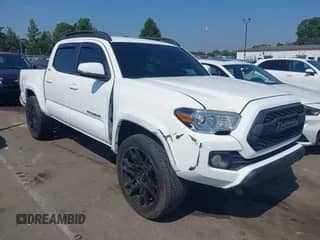 2022 Toyota Tacoma SR5 with VIN 3TMAZ5CN5NM161124, listed as a IAAI auction lot 42668015 with 77,564 mi miles and . Bid and sale history available at DreamBid. Image 1.