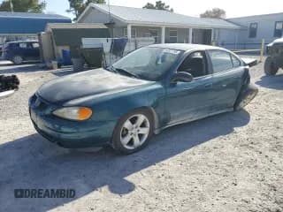 ✅ 2003 Pontiac Grand Am SE • VIN: 1G2NE52F73C138406 • Lot: 92307705. Listed on Copart with 238,112 mi. Free auction sales archive from the USA and detailed vehicle history report at DreamBid. Image 1.
