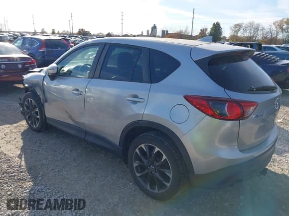 ✅ 2016 Mazda CX-5 Grand Touring • VIN: JM3KE2DY8G0604998 • Lot: 43696169. Listed on IAAI with 104,349 mi. Free auction sales archive from the USA and detailed vehicle history report at DreamBid. Image 3.