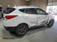 2014 Hyundai Tucson Limited with VIN KM8JUCAG2EU806309, listed as a Copart auction lot 66015735 with 104,328 mi miles and Salvage title. Bid and sale history available at DreamBid. Image 3.