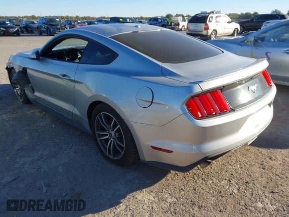 ✅ 2016 Ford Mustang EcoBoost • VIN: 1FA6P8TH6G5216332 • Lot: 43573433. Listed on IAAI with 214,449 mi. Free auction sales archive from the USA and detailed vehicle history report at DreamBid. Image 3.