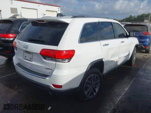 2018 Jeep Grand Cherokee Limited with VIN 1C4RJEBG5JC429811, listed as a IAAI auction lot 43370767 with 77,454 mi miles and . Bid and sale history available at DreamBid. Image 4.