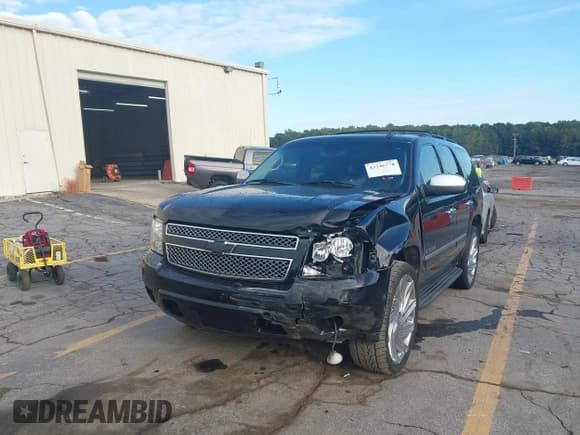 ✅ 2009 Chevrolet Tahoe LTZ • VIN: 1GNFC33079R108257 • Lot: 43346778. Listed on IAAI with 296,581 mi. Free auction sales archive from the USA and detailed vehicle history report at DreamBid. Image 2.