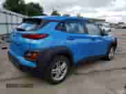 ✅ 2019 Hyundai Kona SE • VIN: KM8K1CAA9KU279115 • Lot: 65712513. Wystawiony na Copart z przebiegiem 62 327 mil mil. Skorzystaj z bezpłatnego archiwum sprzedaży aukcyjnych z USA i zobacz szczegółowy raport historii pojazdu na DreamBid. Zdjęcie 3.