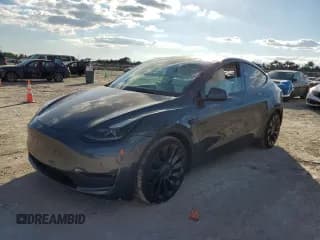 ✅ 2022 Tesla Model Y Performance • VIN: 7SAYGDEFXNF517160 • Lot: 92797085. Listed on Copart with 26,777 mi. Free auction sales archive from the USA and detailed vehicle history report at DreamBid. Image 1.