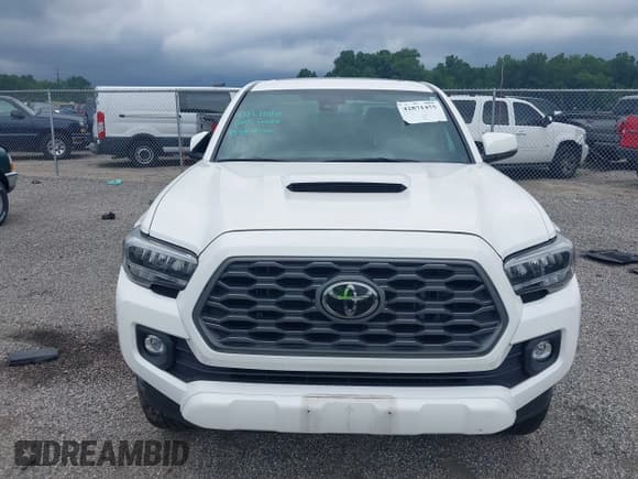 ✅ 2021 Toyota Tacoma SR • VIN: 3TYCZ5AN6MT009299 • Lot: 42871455. Listed on IAAI with 39,366 mi. Free auction sales archive from the USA and detailed vehicle history report at DreamBid. Image 12.