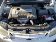 ✅ 2006 Kia Spectra EX • VIN: KNAFE121165239573 • Lot: 70401085. Wystawiony na Copart z przebiegiem 186 787 mil. Bezpłatny archiwum sprzedaży aukcyjnych z USA i szczegółowy raport historii pojazdu na DreamBid. Zdjęcie 11.