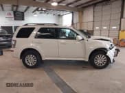 ✅ 2010 Mercury Mariner Premier • VIN: 4M2CN8HGXAKJ00279 • Lot: 41748487. Listed on IAAI with 116,565 mi. Free auction sales archive from the USA and detailed vehicle history report at DreamBid. Image 13.