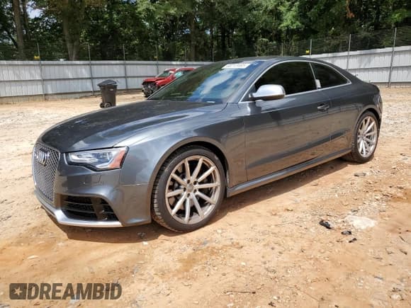 ✅ 2013 Audi RS 5 • VIN: WUAC6AFR1DA902733 • Lot: 68213465. Listed on Copart with 33,989 mi. Free auction sales archive from the USA and detailed vehicle history report at DreamBid. Image 1.