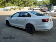 ✅ 2015 Volkswagen Jetta SE • VIN: 3VWD17AJ7FM309823 • Lot: 68598155. Listed on Copart with 82,482 mi. Free auction sales archive from the USA and detailed vehicle history report at DreamBid. Image 2.