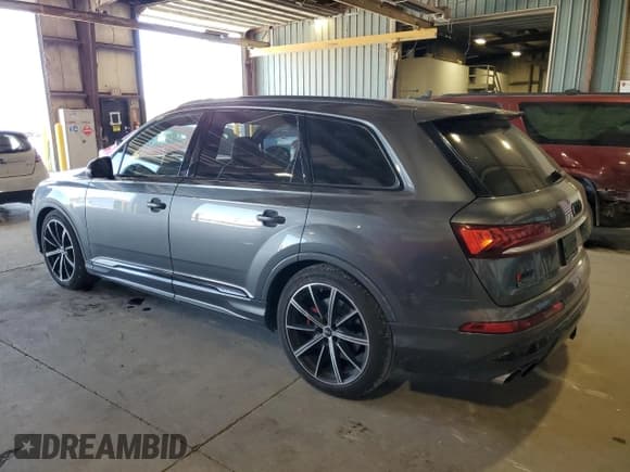 ✅ 2021 Audi SQ7 Prestige • VIN: WA1VWBF7XMD015487 • Лот: 84467835. Опубликован ранее на Copart с пробегом 76 133 миль. Бесплатный доступ к архиву аукционных продаж из США и подробный отчёт об истории автомобиля на DreamBid. Изображение 2.