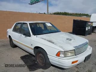 ✅ 1991 Plymouth Acclaim • VIN: 1P3XA4634MF582546 • Lot: 41657565. Wystawiony na IAAI z przebiegiem 85 985 mil. Bezpłatny archiwum sprzedaży aukcyjnych z USA i szczegółowy raport historii pojazdu na DreamBid. Zdjęcie 1.