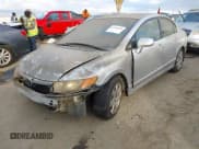 ✅ 2007 Honda Civic LX • VIN: JHMFA16567S006818 • Lot: 43703856. Listed on IAAI with 206,942 mi. Free auction sales archive from the USA and detailed vehicle history report at DreamBid. Image 2.