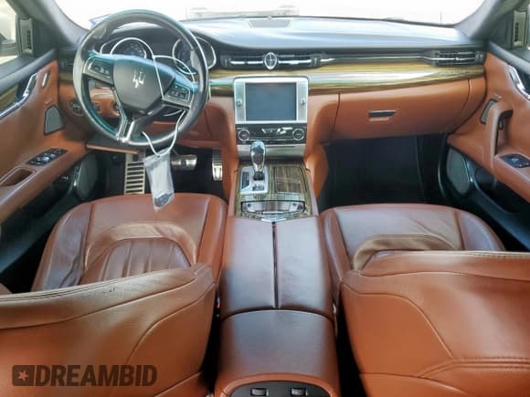 ✅ 2014 Maserati Quattroporte GTS • VIN: ZAM56PPA4E1084669 • Лот: 61640355. Опубликован ранее на Copart с пробегом 89 733 миль. Бесплатный доступ к архиву аукционных продаж из США и подробный отчёт об истории автомобиля на DreamBid. Изображение 8.