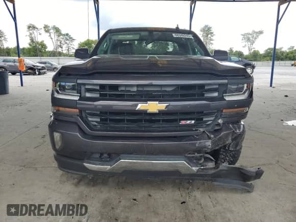 2016 Chevrolet Silverado 1500 LT с VIN 3GCUKRECXGG290515, выставлен на аукционе Copart как лот 66340245 с пробегом 125 010 миль миль и Списание • Salvage title. История ставок и продаж доступна на DreamBid. Изображение 5.