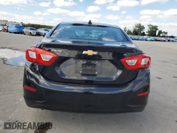 2017 Chevrolet Cruze LT с VIN 1G1BE5SM9H7247794, выставлен на аукционе Copart как лот 90426235 с пробегом 101 687 миль миль и Списание • Salvage title. История ставок и продаж доступна на DreamBid. Изображение 6.