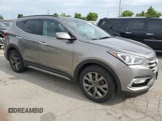 ✅ 2017 Hyundai Santa Fe Ultimate • VIN: 5XYZWDLA2HG492375 • Лот: 61767144. Опубликован ранее на Copart с пробегом 145 996 миль. Бесплатный доступ к архиву аукционных продаж из США и подробный отчёт об истории автомобиля на DreamBid. Изображение 4.