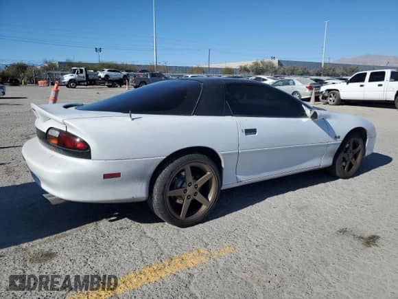 2002 Chevrolet Camaro Z28 z VIN 2G1FP22G922146192, wystawiony jako Copart lot #87924525 z przebiegiem 151 770 mil mil oraz Szkoda całkowita • Salvage title. Historia ofert i sprzedaży dostępna na DreamBid. Obrazek 3.