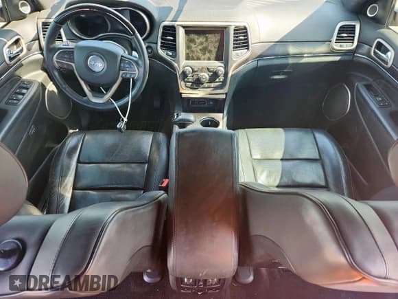 ✅ 2014 Jeep Grand Cherokee • VIN: 1C4RJEJMXEC585632 • Lot: 62036515. Listed on Copart with 148,660 mi. Free auction sales archive from the USA and detailed vehicle history report at DreamBid. Image 8.