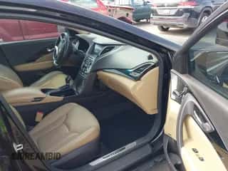 2015 Hyundai Azera Limited z VIN KMHFH4JG8FA435093, wystawiony jako IAAI lot #41601706 z przebiegiem 142 820 mil mil oraz . Historia ofert i sprzedaży dostępna na DreamBid. Obrazek 5.