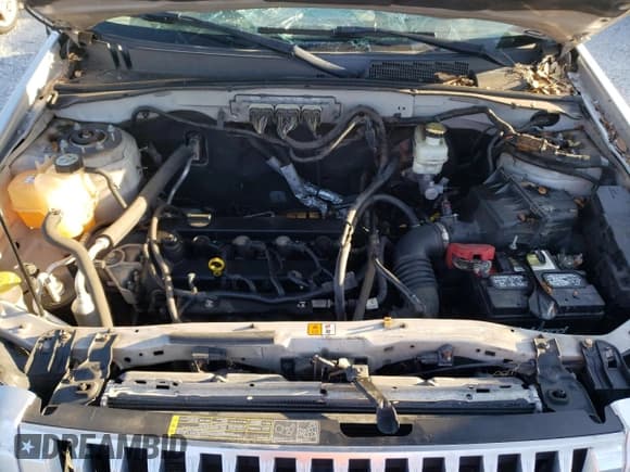 ✅ 2009 Mercury Mariner Premier • VIN: 4M2CU87789KJ23933 • Lot: 45120455. Listed on Copart with 104,465 mi. Free auction sales archive from the USA and detailed vehicle history report at DreamBid. Image 12.