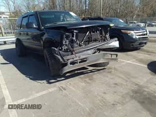2003 Chevrolet Tahoe LT with VIN 1GNEK13Z53R205868, listed as a IAAI auction lot 41897860 with 191,076 mi miles and . Bid and sale history available at DreamBid. Image 1.