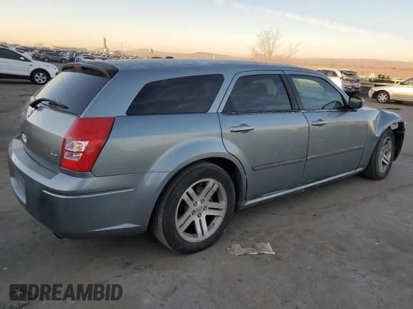 2007 Dodge Magnum с VIN 2D4FV47V77H846848, выставлен на аукционе Copart как лот 82251074 с пробегом 160 158 миль миль и Списание • Salvage title. История ставок и продаж доступна на DreamBid. Изображение 3.