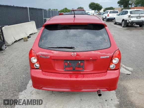 ✅ 2003 Mazda Protege • VIN: JM1BJ245531201947 • Lot: 70252245. Listed on Copart with 143,480 mi. Free auction sales archive from the USA and detailed vehicle history report at DreamBid. Image 6.