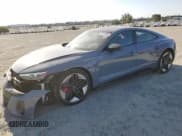 ✅ 2022 Audi RS e-tron GT • VIN: WAUAHBFW5N7902272 • Лот: 62742365. Опубликован ранее на Copart с пробегом 6 922 миль. Бесплатный доступ к архиву аукционных продаж из США и подробный отчёт об истории автомобиля на DreamBid. Изображение 1.