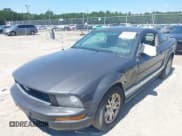 ✅ 2007 Ford Mustang Deluxe • VIN: 1ZVFT80NX75211227 • Lot: 43160650. Listed on IAAI with 166,297 mi. Free auction sales archive from the USA and detailed vehicle history report at DreamBid. Image 2.