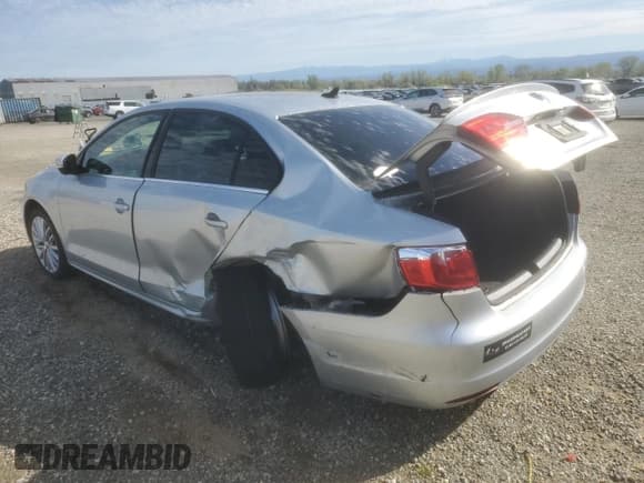 ✅ 2014 Volkswagen Jetta SEL • VIN: 3VWL17AJ4EM426947 • Lot: 49431185. Listed on Copart with 104,254 mi. Free auction sales archive from the USA and detailed vehicle history report at DreamBid. Image 2.