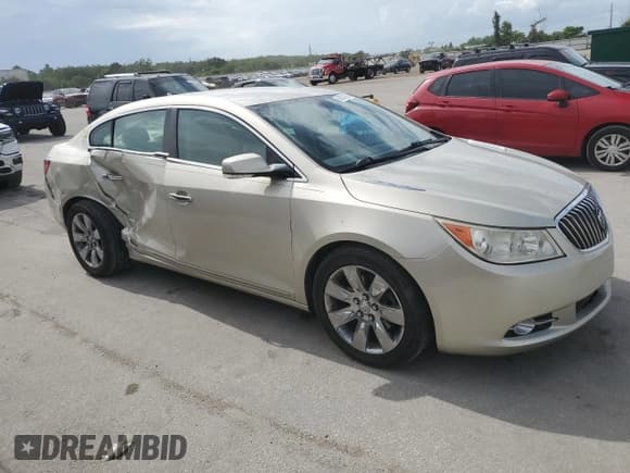 ✅ 2013 Buick LaCrosse Leather • VIN: 1G4GC5E32DF330890 • Lot: 60721895. Listed on Copart with 122,769 mi. Free auction sales archive from the USA and detailed vehicle history report at DreamBid. Image 4.